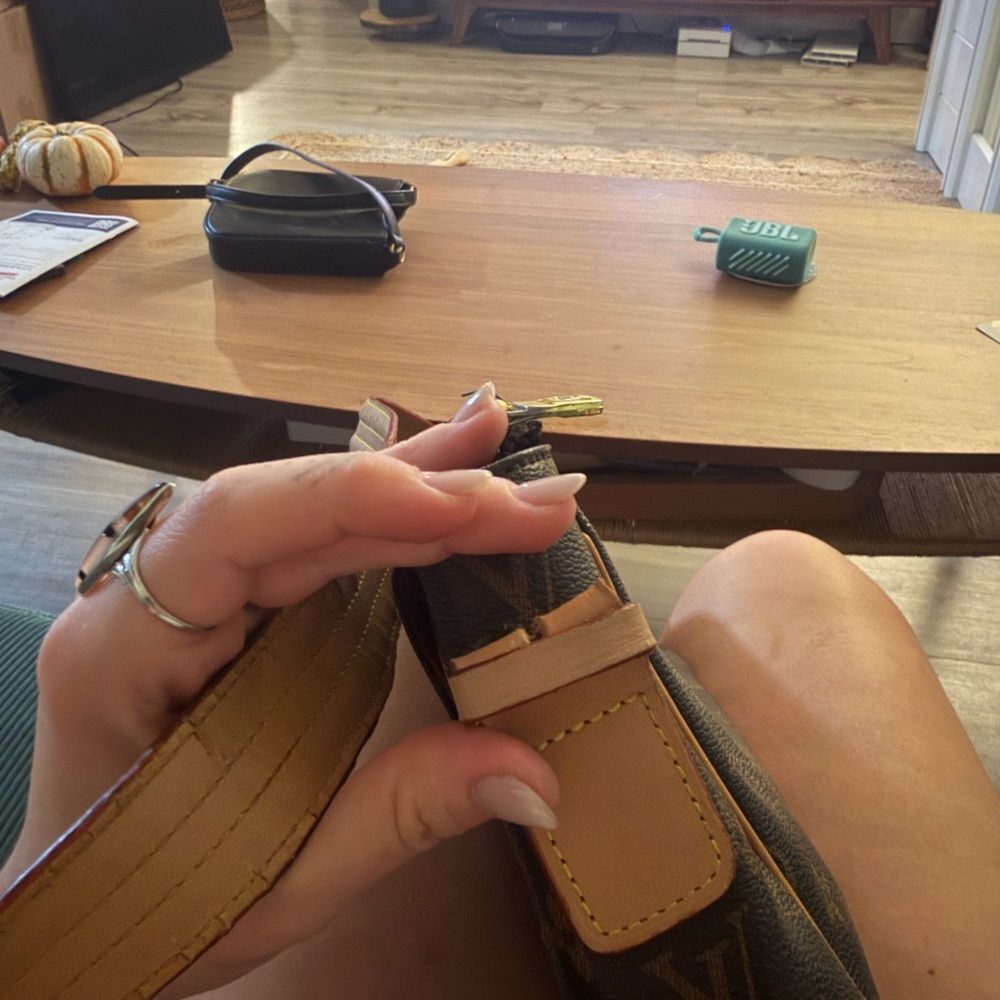 Authentic Louis Vuitton Red Interior with Gold Tag - Picture 7 of 9
